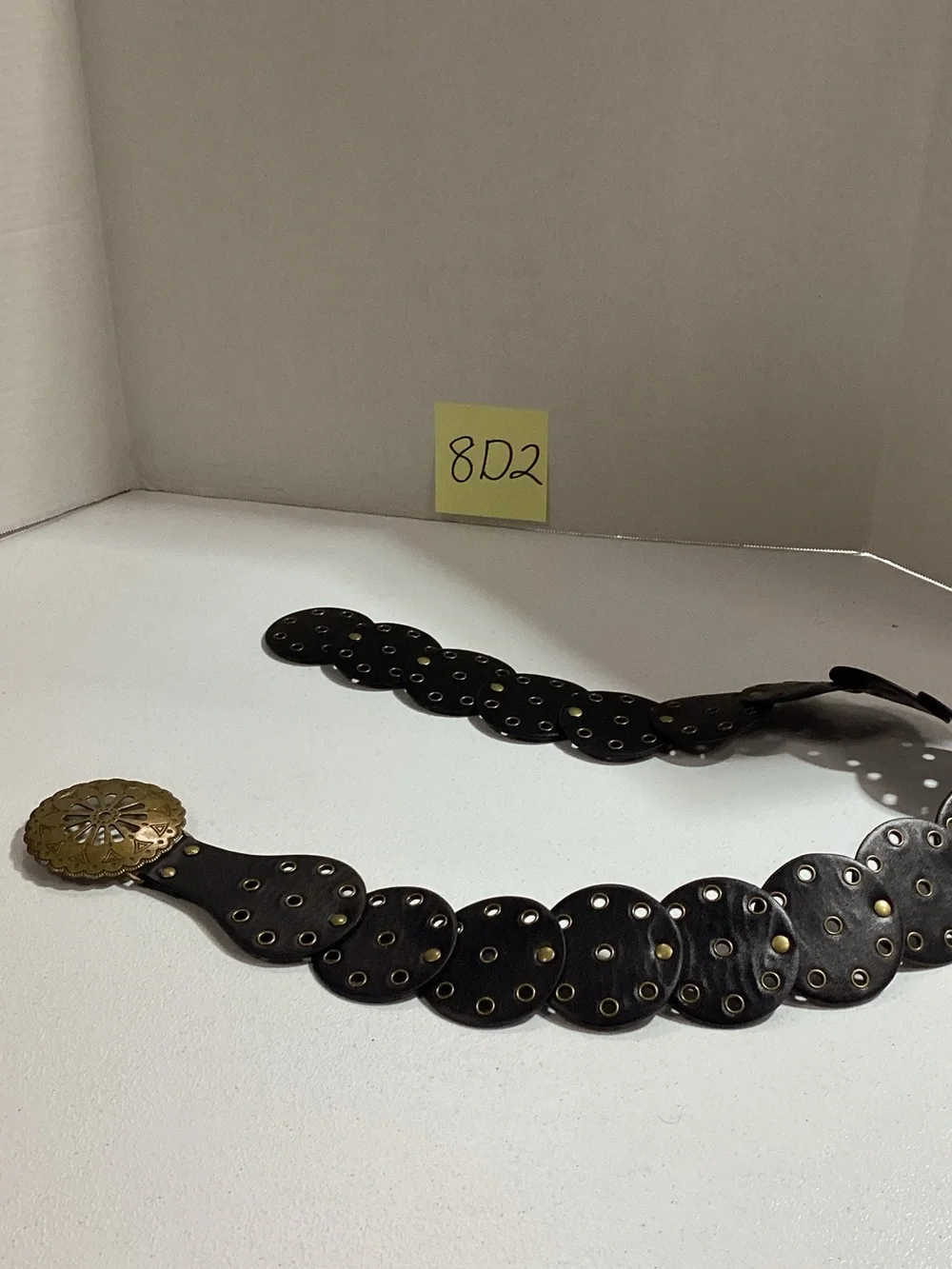 Women’s Black Leather Disc Belt with Brass Medallion